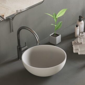 Designed for compact elegance, the SOLIDTHIN XS Counter Vessel by Ideavit brings sophisticated style to small bathrooms with its round shape and thin edges