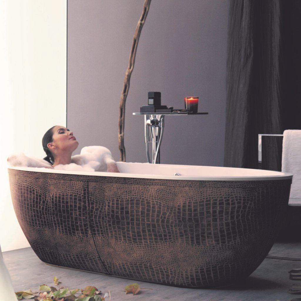 Exotic freestanding bathtub by AquaDesign with crocodile skin texture and matte finish