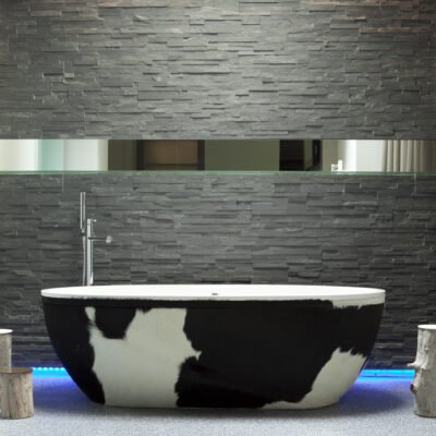 STONE1 Freestanding Bathtub by AquaDesign with cowhide upholstery design