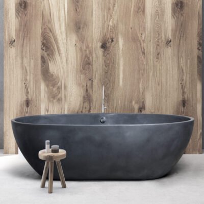 The STONE1 Freestanding Bathtub by AquaDesign, featuring a Venetian plaster finish, is a luxurious blend of modern design and timeless Italian artistry