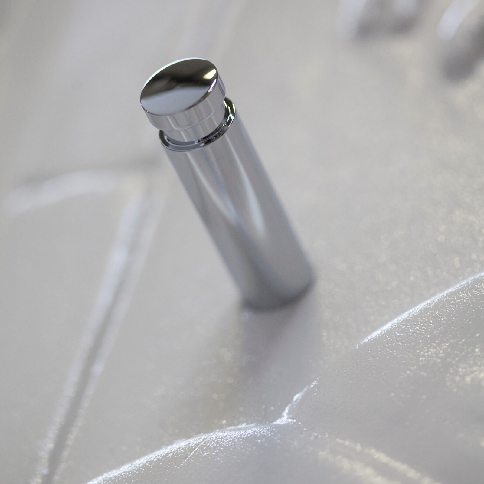 Close-up view of the elegantly designed towel suspension bar on the Ateliers CINIER Art Deco bath towel warmer