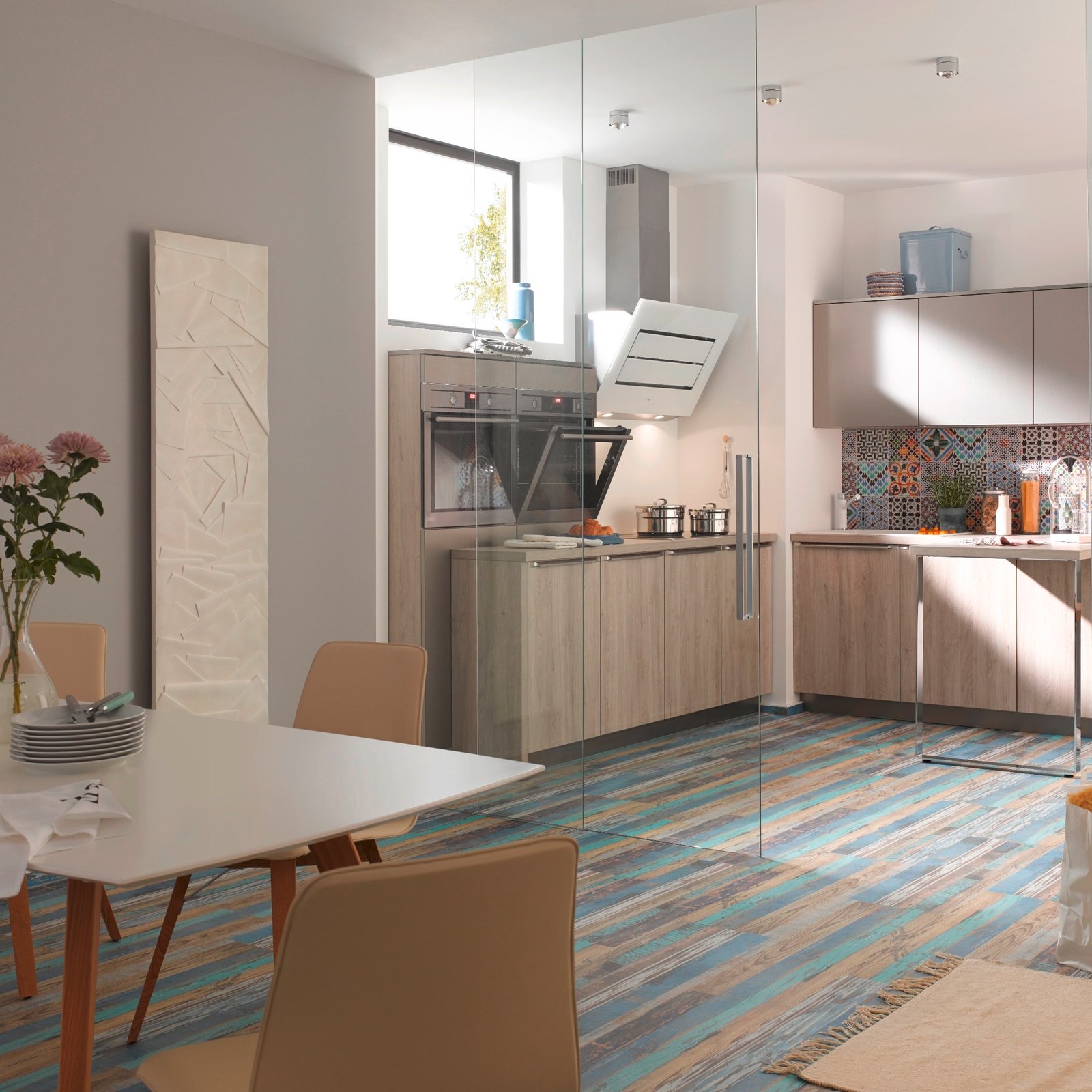 A contemporary Edo bath towel warmer mounted on a wall, radiating heat evenly