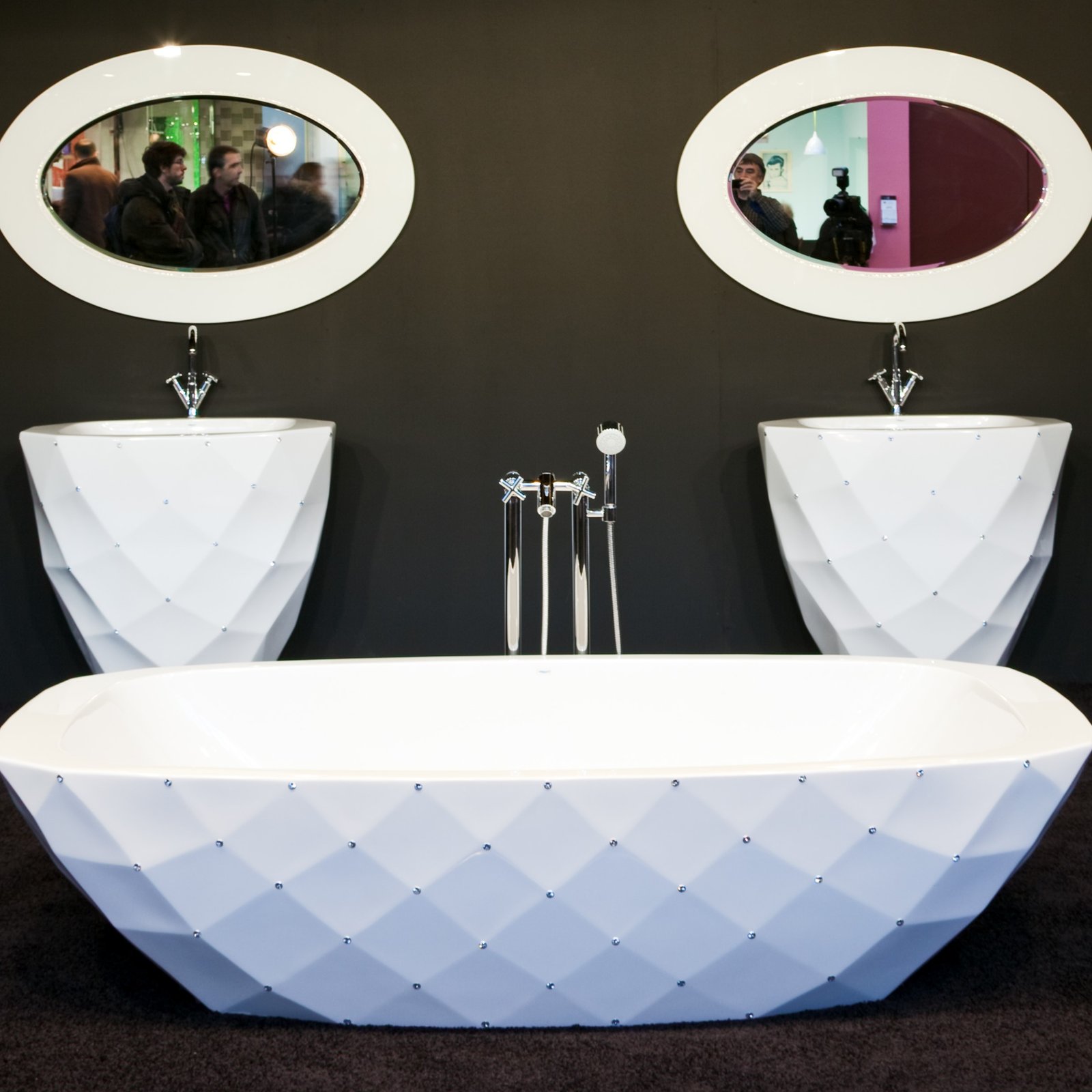 Elegant freestanding bathtub featuring diamond-shaped facets and adorned with genuine Swarovski crystals