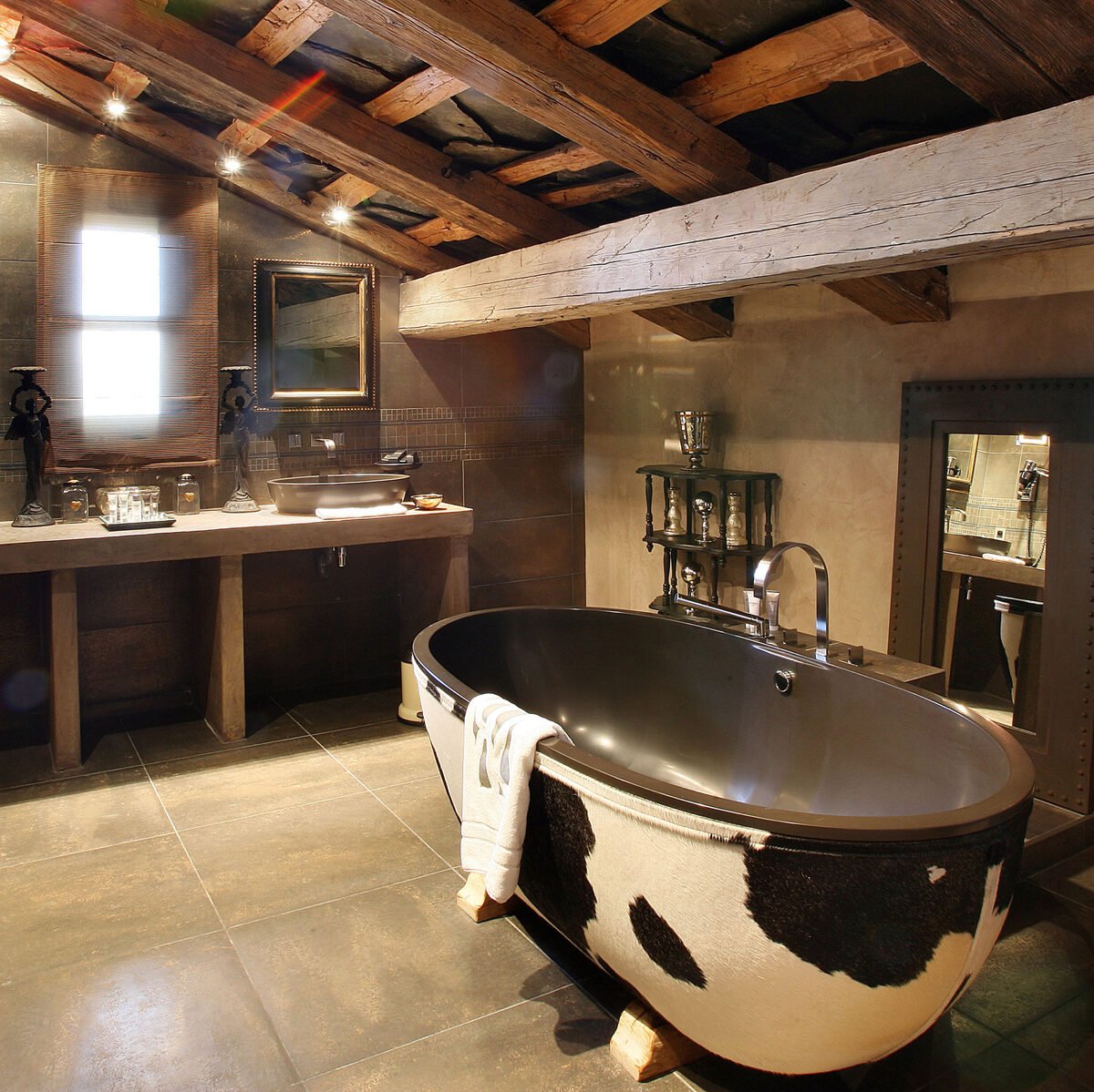 Luxury bathtub with a bold animal print cowhide Luxury bathtub with a bold animal print cowhide design by AquaDesign