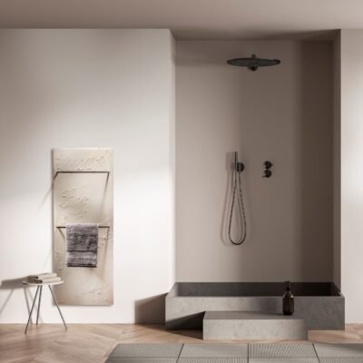 Ateliers CINIER Origin towel warmer with a mirrored front, combining luxury design and efficient heating