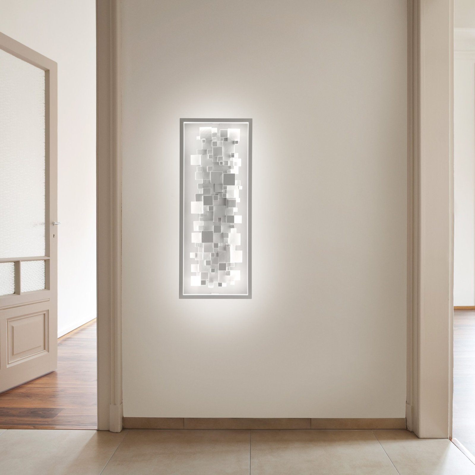 Atlantis LED light fixture by CINIER, blending energy efficiency with elegant steel and stone design