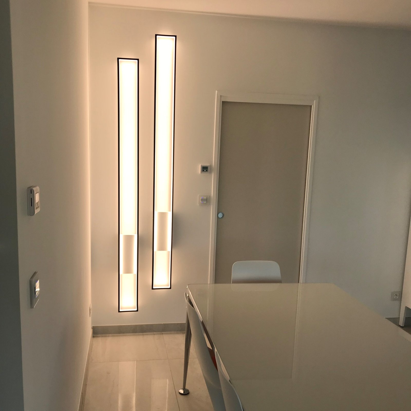 Handcrafted Mire wall LED lamp by CINIER, offering 75% energy savings and modern ambiance