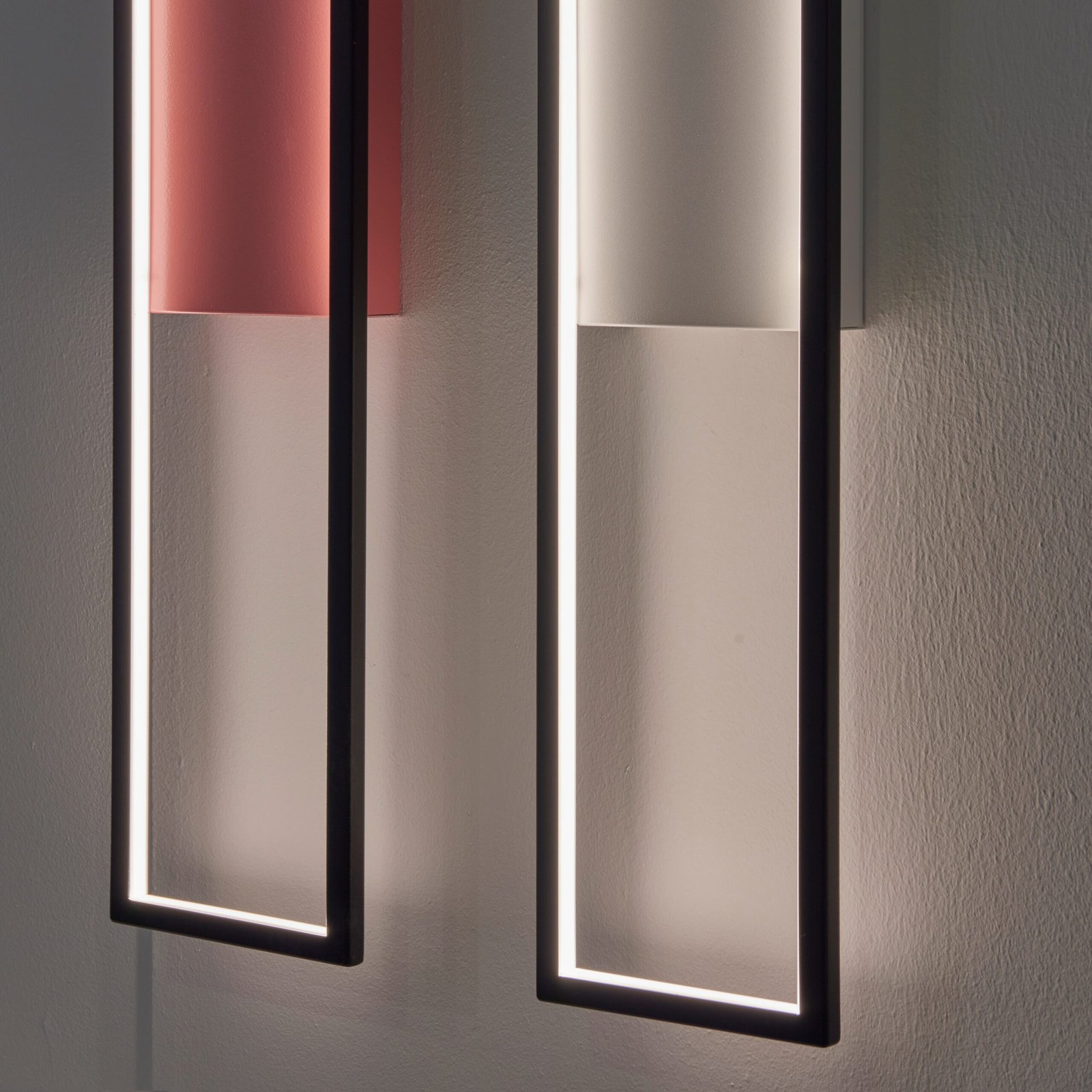 Close-up of the Mire LED wall light, showcasing its sophisticated design and customizable color LED lighting options