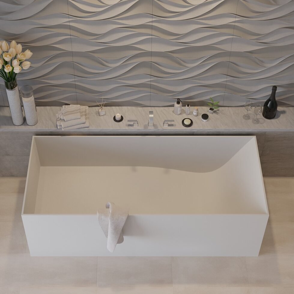 Minimalist bathtub by Ideavit, featuring sleek aesthetics, adjustable feet, and a solid surface material