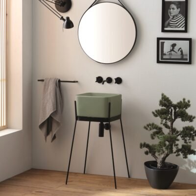 IBRIDO Square Pedestal Sink in glossy green ceramic with a sleek black metal pedestal