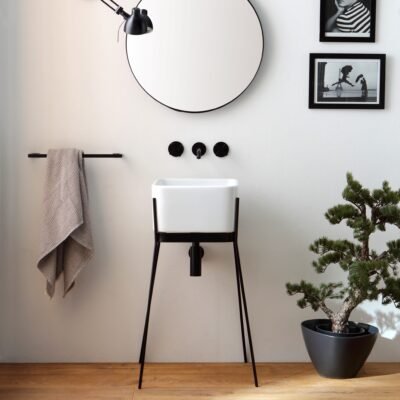 IBRIDO Square Pedestal Sink with glossy white ceramic basin and sleek black metal pedestal