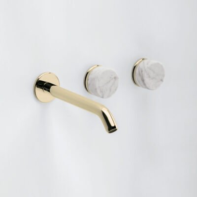 PORTOFINO luxury wall-mounted faucet for freestanding washbasins, shown in polished gold with white Carrara marble handles