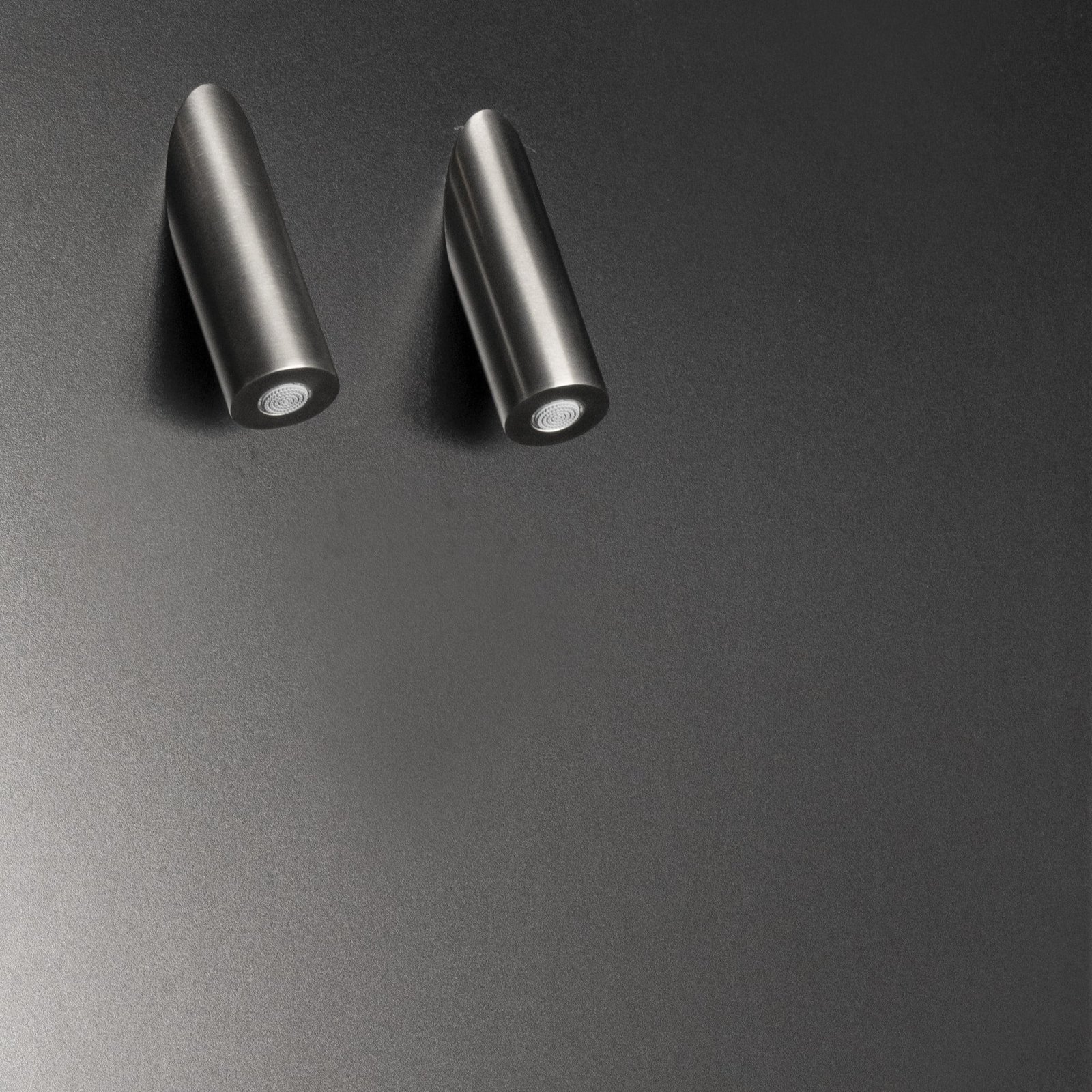 Italian-crafted tubular rainfall shower heads, designed for versatility in indoor and outdoor spaces