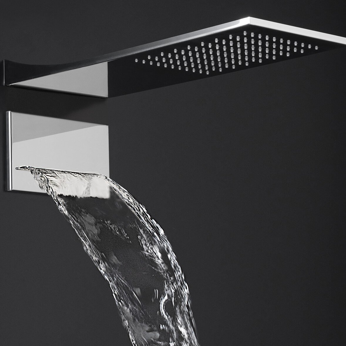 Italian-crafted Evone shower set featuring a rainfall head and blade-like waterfall cascade, available in polished, brushed, matte black, and other finishes