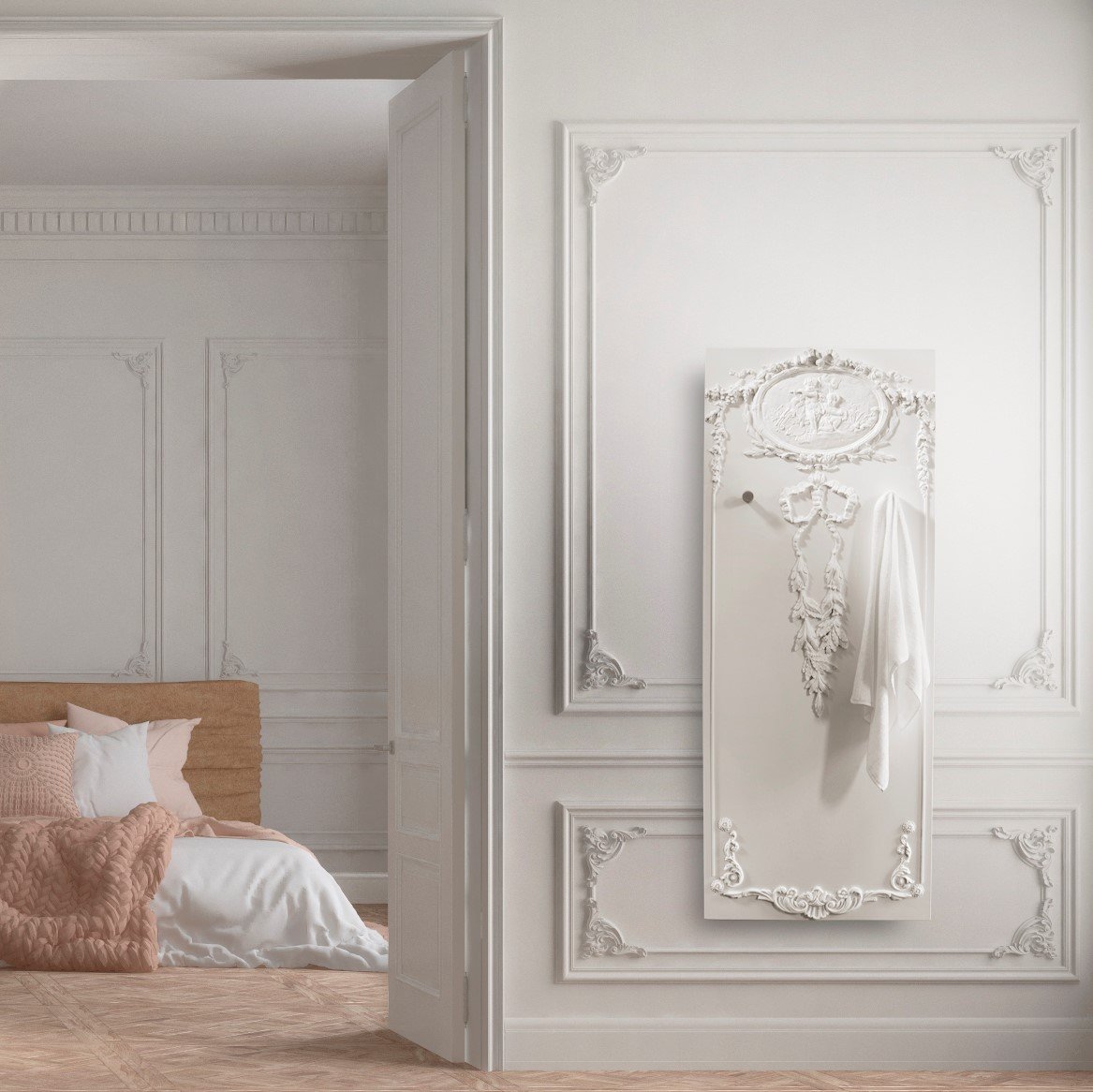 A luxurious and classical Moliere towel warmer radiator by CINIER, with intricate Baroque detailing, is perfect for prestigious interiors