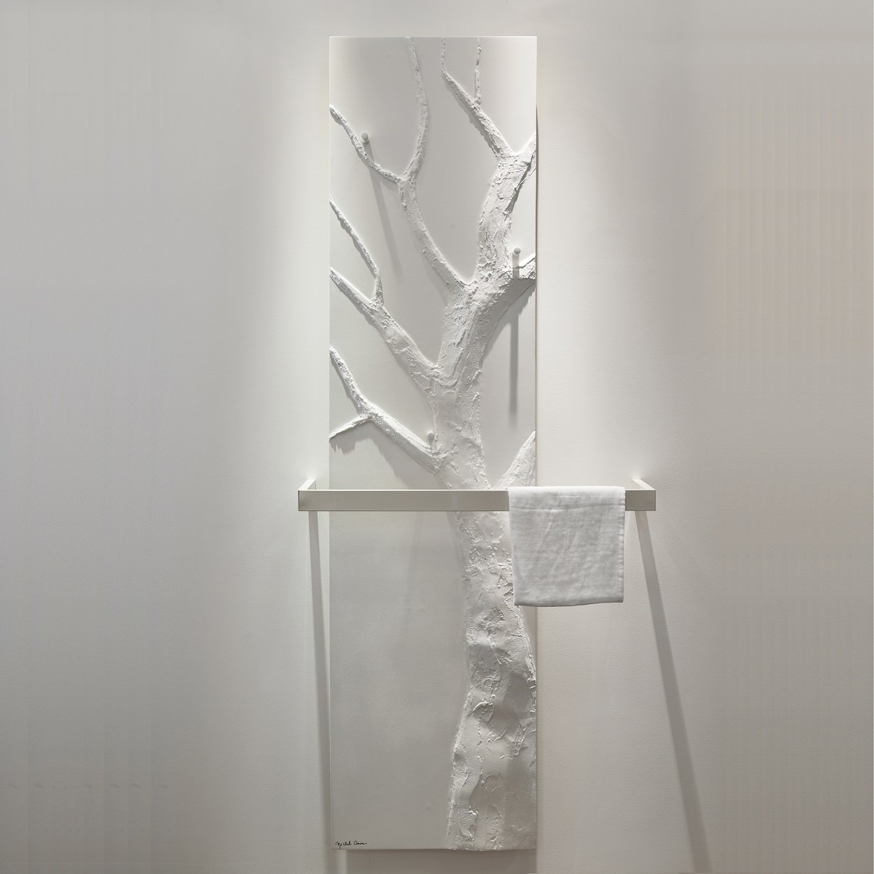 Tree towel warmer radiator by Ateliers CINIER, featuring Olycal® stone for uniform heating
