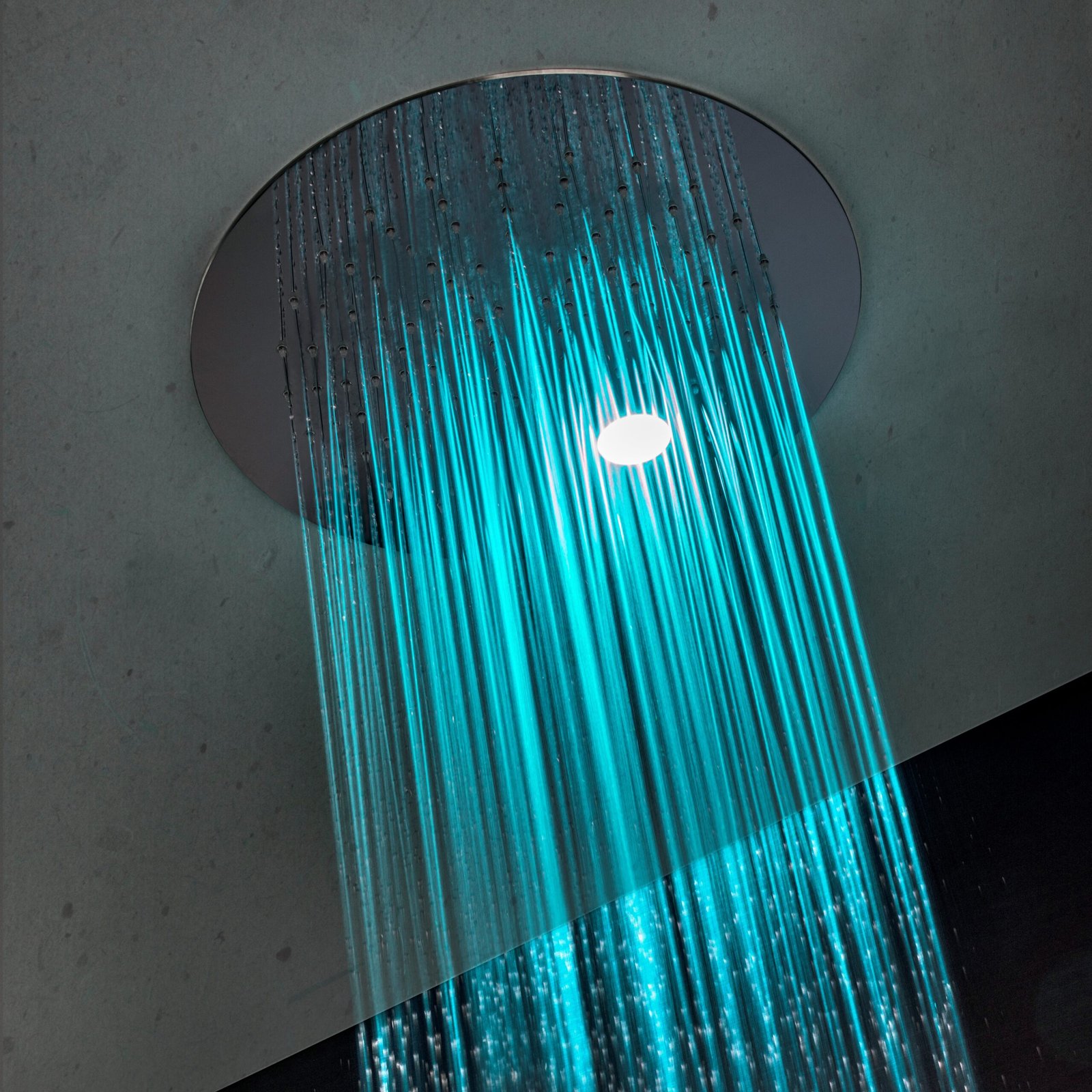 Rain Therapy chromotherapy shower head Rain Therapy chromotherapy shower head in polished stainless steel finish, offering dual functions of therapeutic lighting