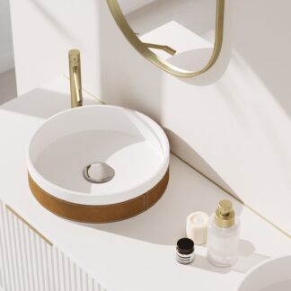 This RING Counter Vessel by IMAGE combines leather with a solid surface, embodying sophisticated European design