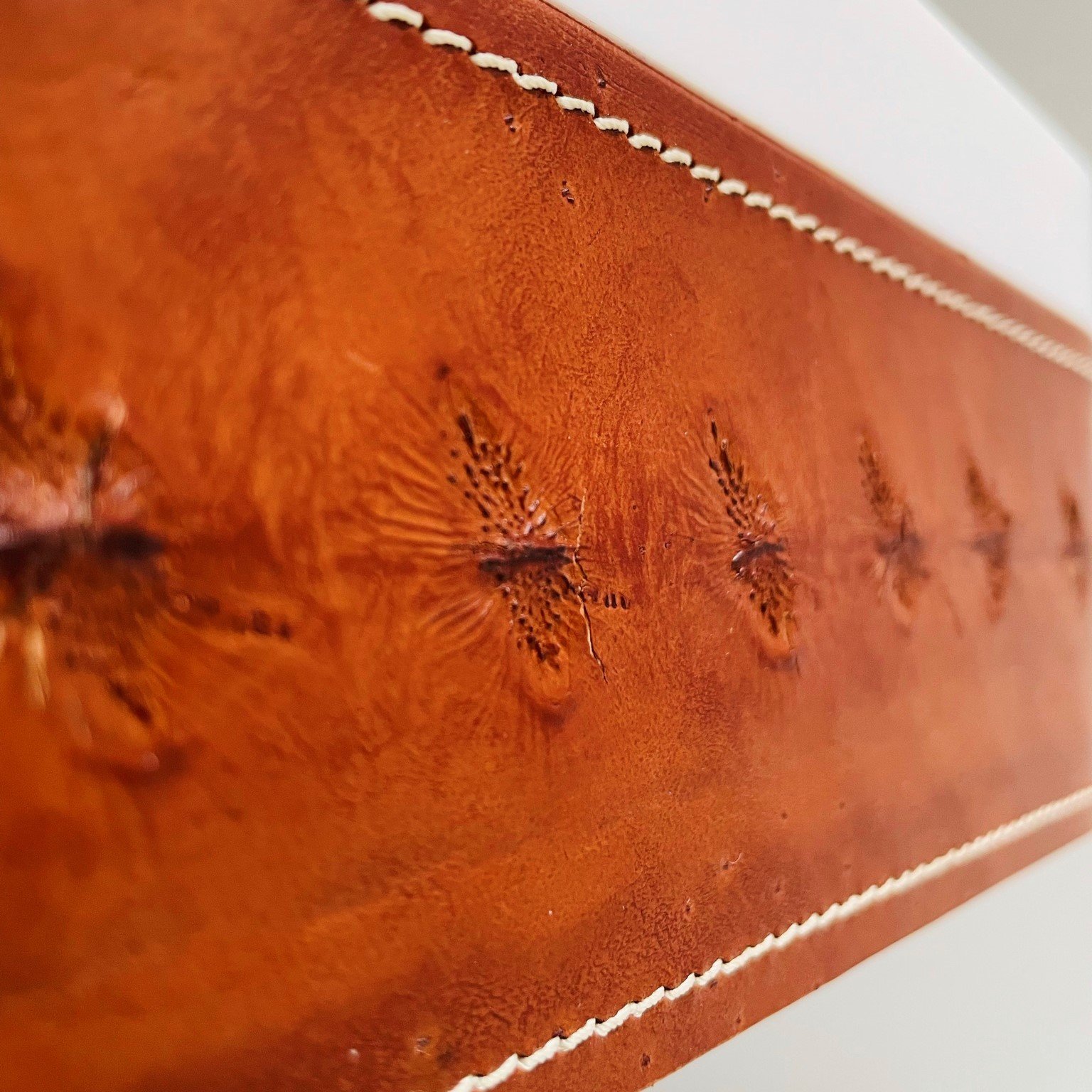 Premium Frame Counter Vessel with split finish, combining wood veneer, carbon, cow leather, and other materials