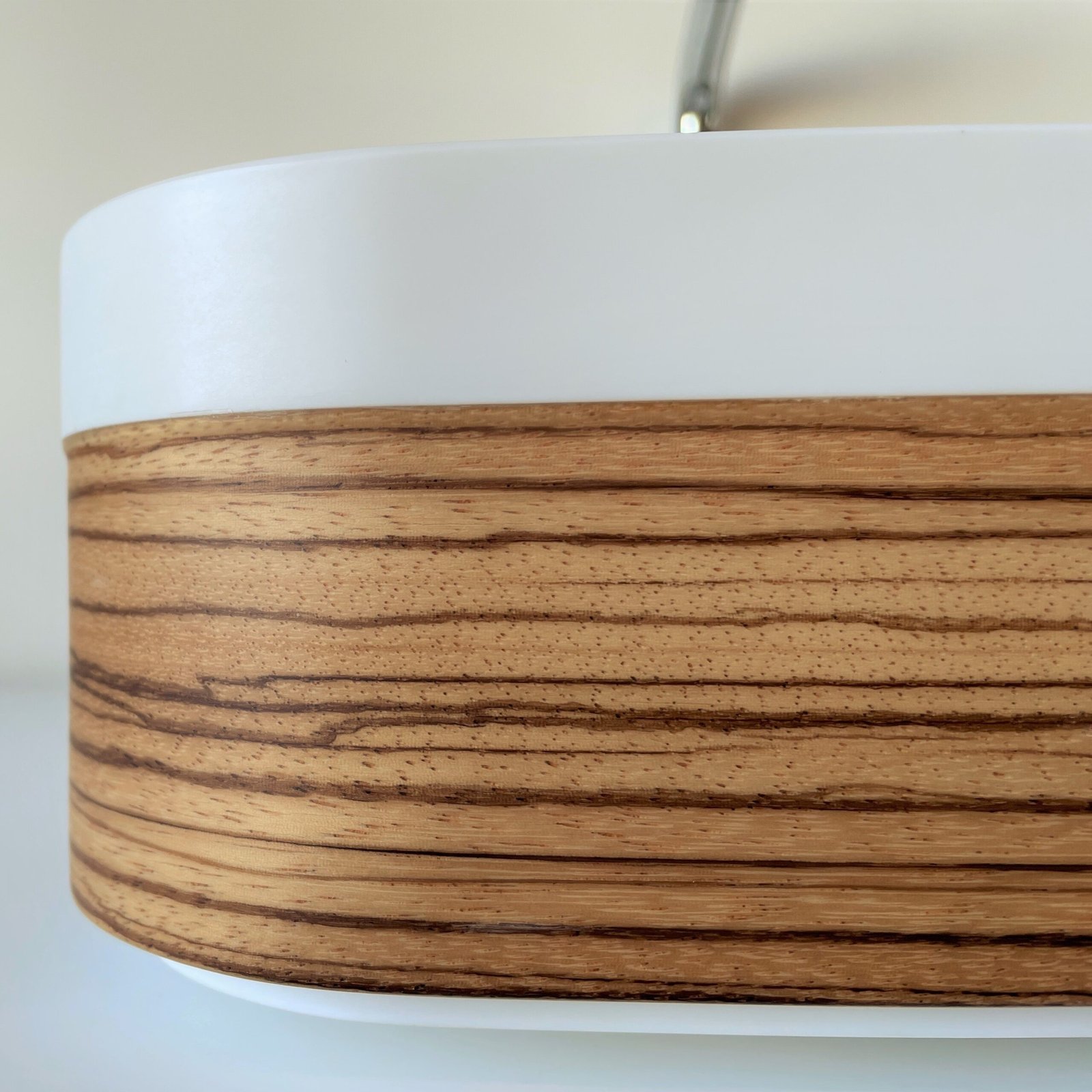 IMAGE’s Capsule wooden counter vessel IMAGE’s Capsule wooden counter vessel, meticulously handcrafted with layers of epoxy resin for durability, is perfect for sophisticated bathroom