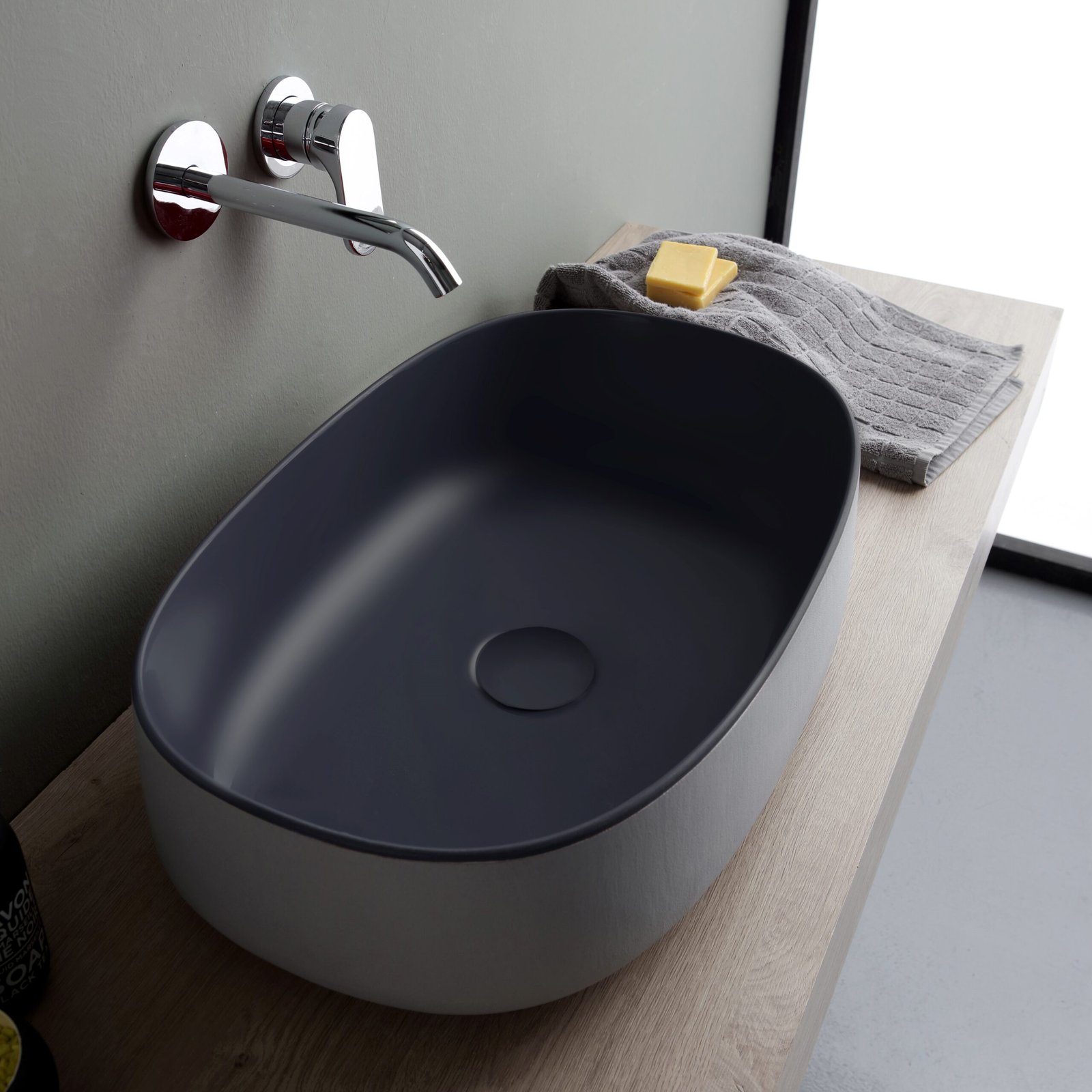 Timeless oval ceramic washbasin Timeless oval ceramic washbasin crafted with ecomalta and artisanal expertise
