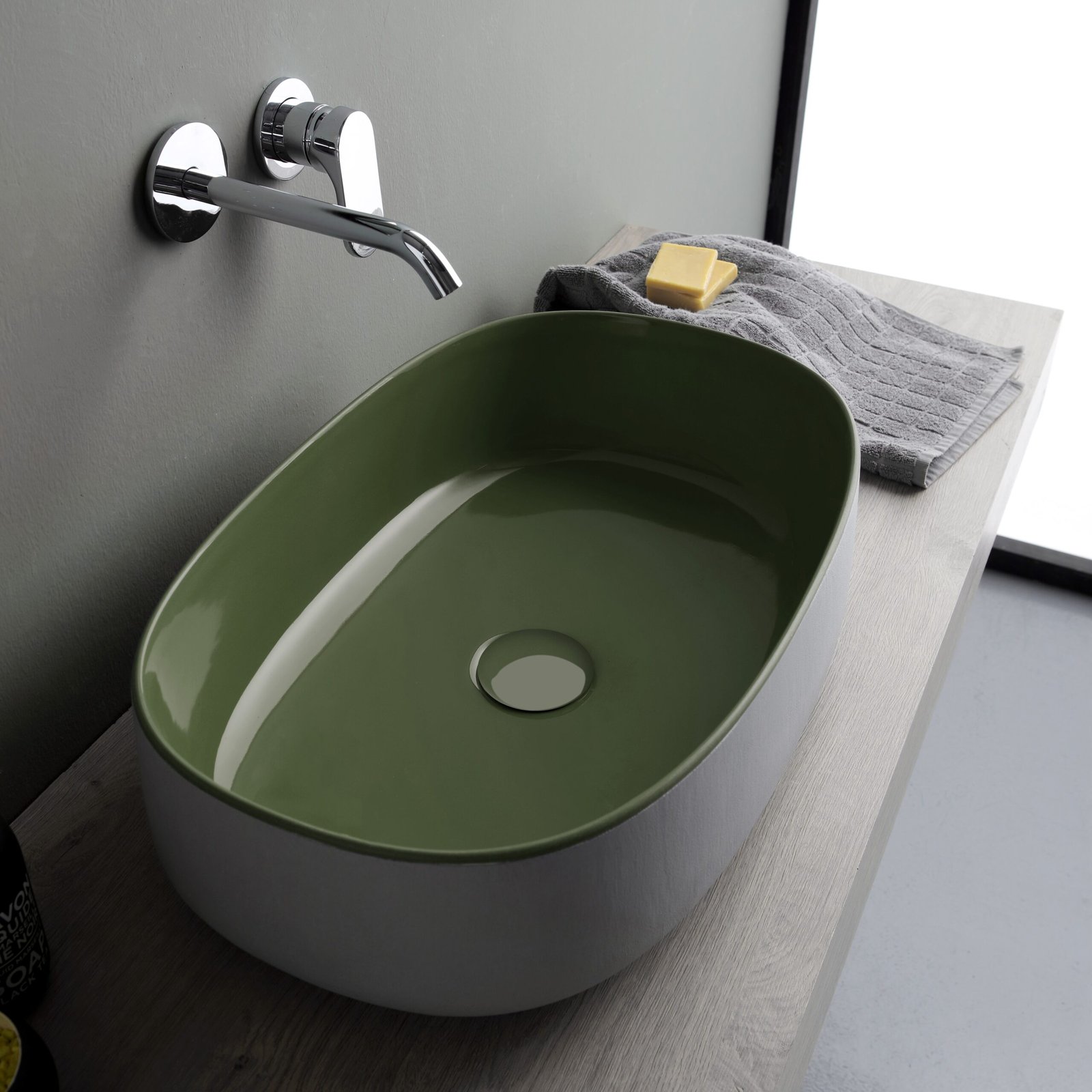 Handcrafted oval washbasin from the Bucchero collection Handcrafted oval washbasin from the Bucchero collection, merging sustainable materials with 100% Italian-made craftsmanship