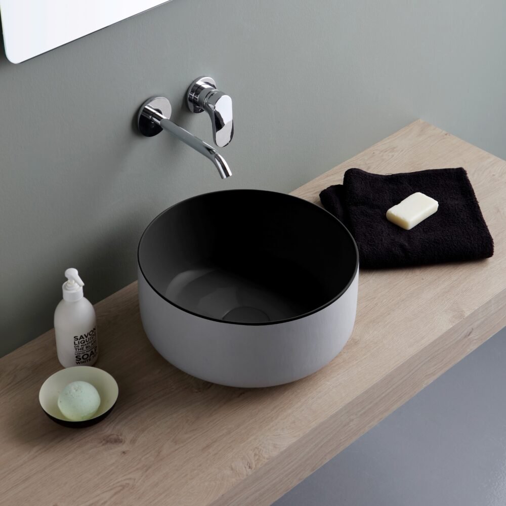 Unique round washbasin from the Bucchero collection, showcasing Italian craftsmanship