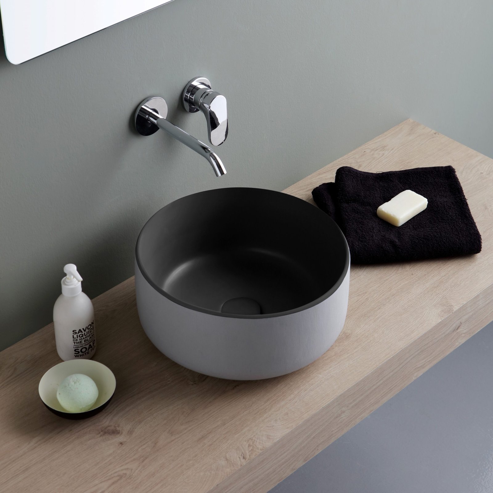 Soft, rounded ceramic washbasin Soft, rounded ceramic washbasin inspired by nature, designed to elevate your bathroom’s visual appeal