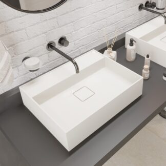 Side view of a small rectangular freestanding washbasin from the Ideavit Collection 2023, highlighting its white color