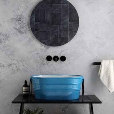 The Tinozza Elongated Counter Vessel by Horganica transforms your vanity into a work of art
