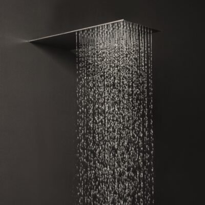 Sleek 20″ x 9″ rectangular stainless steel wall-mounted rainfall shower head with 99 limescale-resistant nozzles