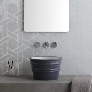 The Bacile Round Counter Vessel seamlessly adapts to both contemporary and rustic design themes, making it the ideal choice for versatile interiors