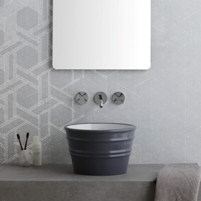 The Bacile Round Counter Vessel seamlessly adapts to both contemporary and rustic design themes, making it the ideal choice for versatile interiors