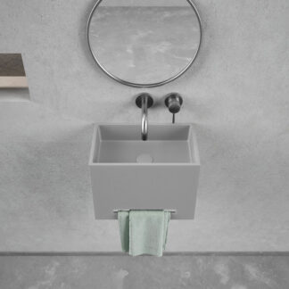 Grey concrete wall-mounted washbasin with minimalist design, towel bar, and anti-scratch finish