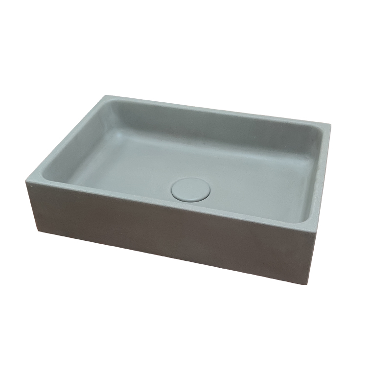 Crafted from premium concrete, the Sol Rectangular Washbasin by Ideavit stands out with its angular lines and integrated grid drain