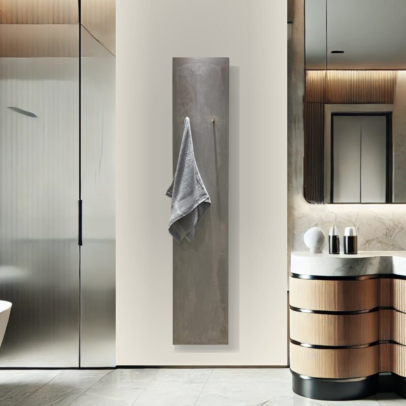 Minimalist Beige Concrete Towel Warmer – The UNI radiator offers efficient warmth and sophisticated style, with a slim profile and elegant brushed brass towel hooks, perfect for compact or multi-unit installations.