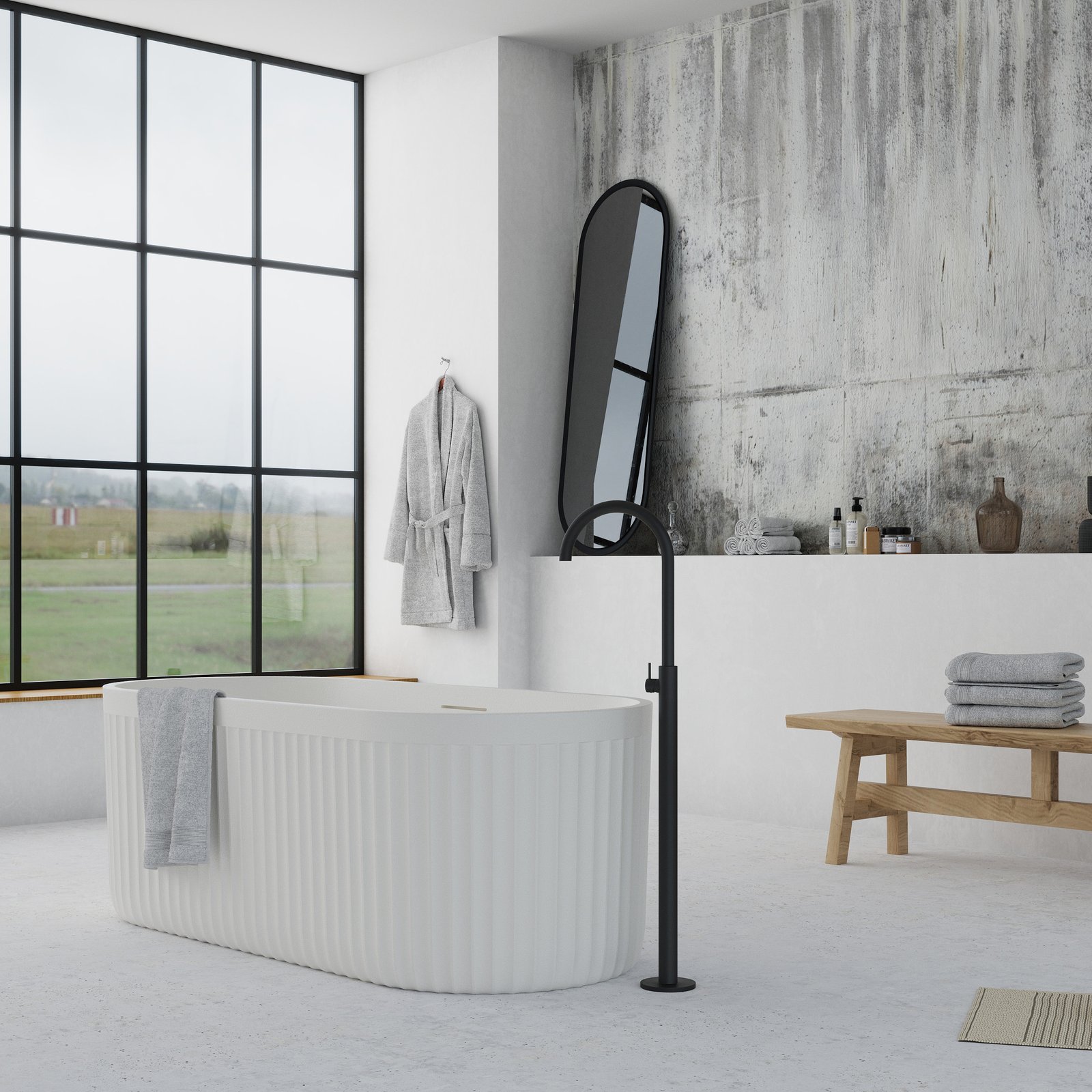 Elegant white bathtub from Ideavit’s ARCHTEC collection, featuring Rock Texture material and sculptural design.