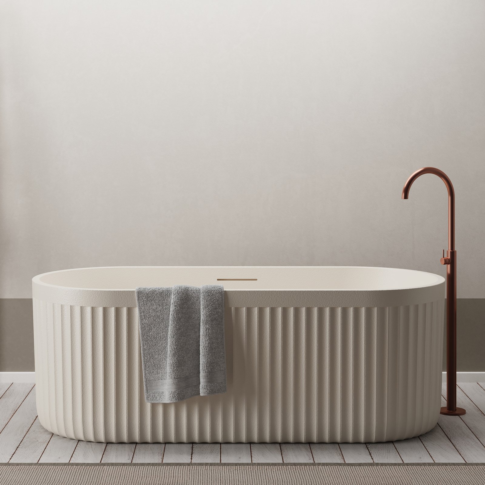 Cream-colored freestanding bathtub with ribbed rock-texture exterior, set in a minimalist modern bathroom.
