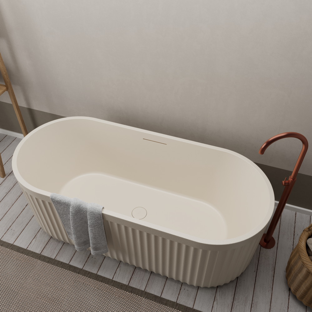 Ideavit Archtec cream freestanding bathtub in cream finish, showcasing its sculptural design and elegant overflow feature.