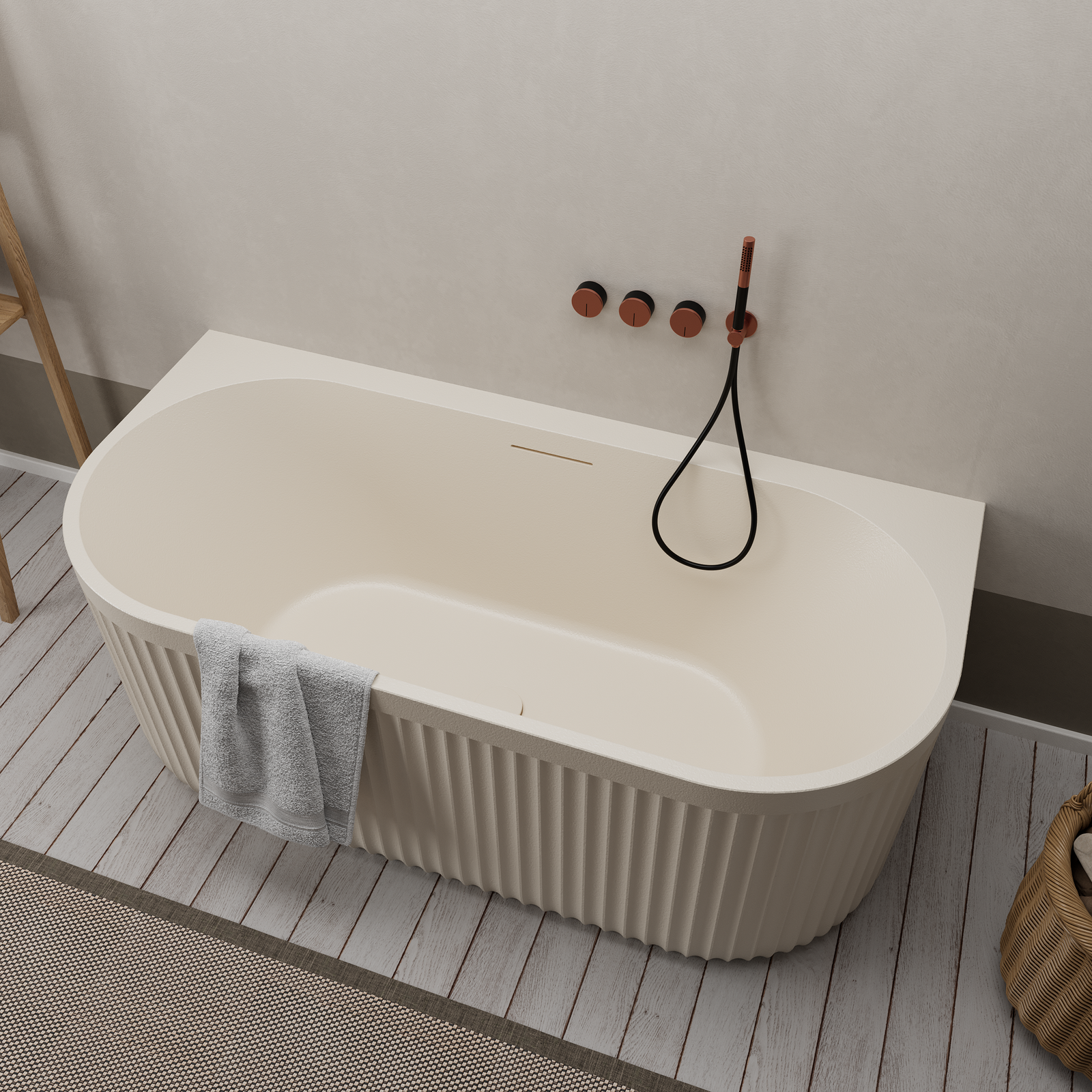 Freestanding cream bathtub positioned against a wall Freestanding cream bathtub positioned against a wall, featuring a soft matte texture and pop-up drain.