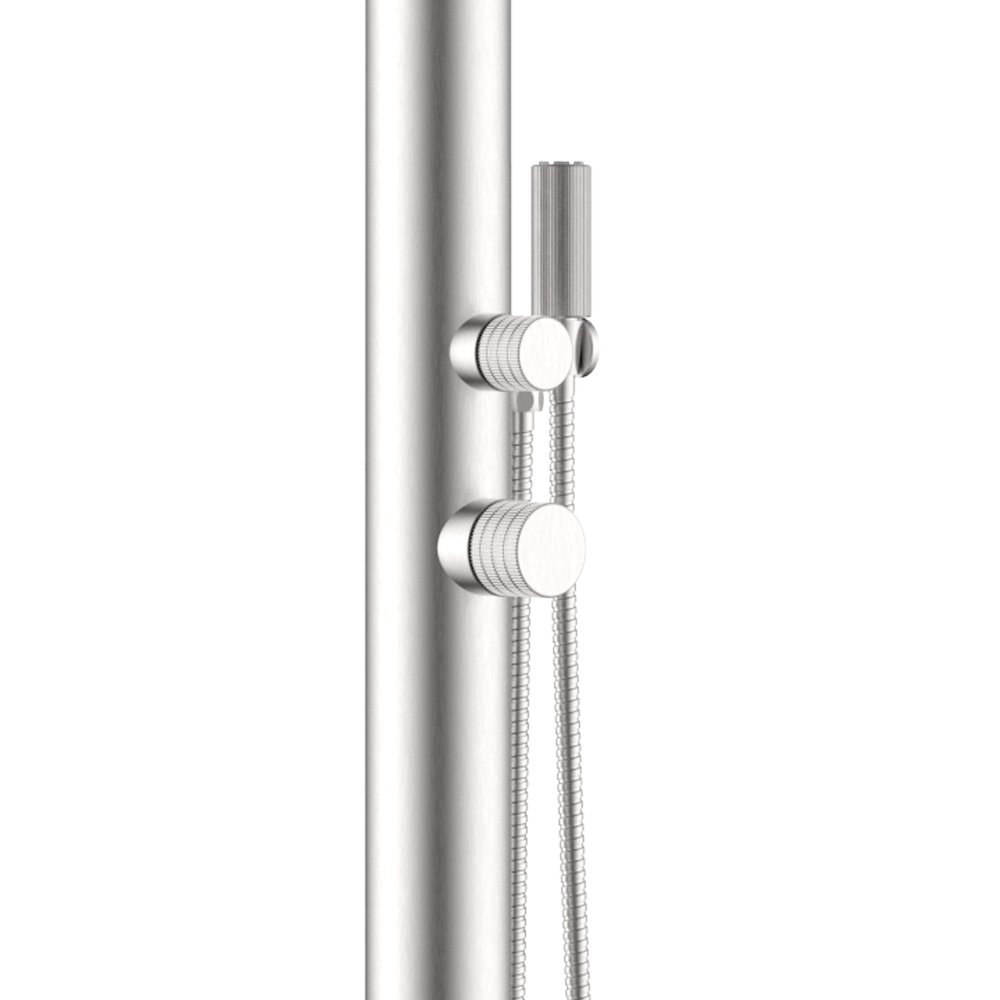 Close-up view of a modern stainless steel outdoor shower column with an integrated hand shower and mixer controls.