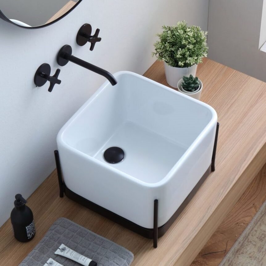 Sleek and contemporary, the IBRIDO Square Counter Vessel by Horganica, crafted in glossy white ceramic, brings modern Italian elegance